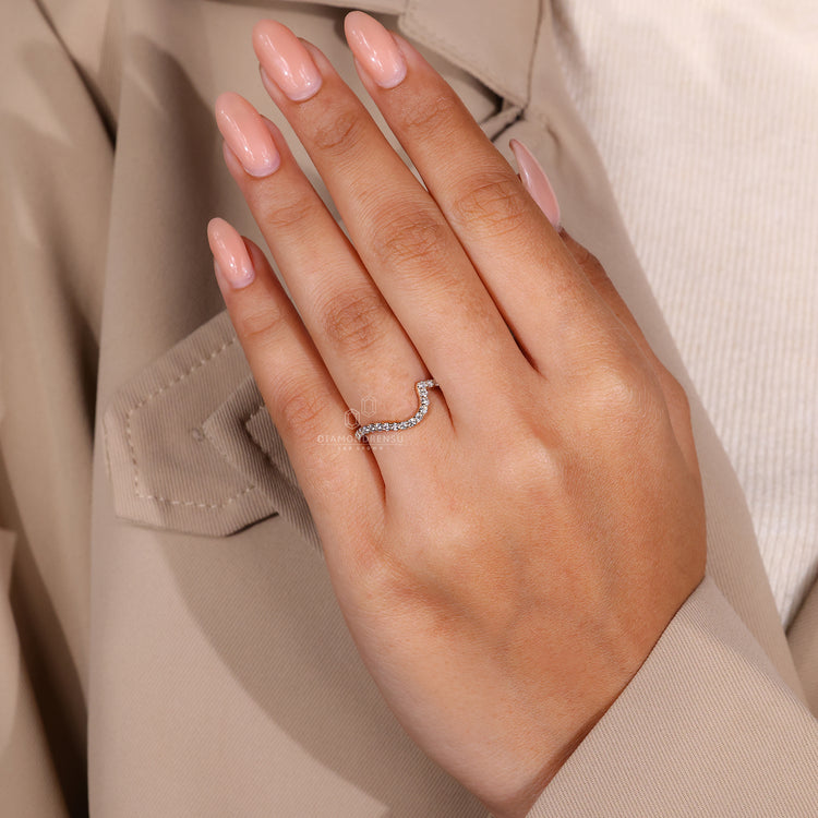 Lab grown diamond band in a sleek curved wedding style.