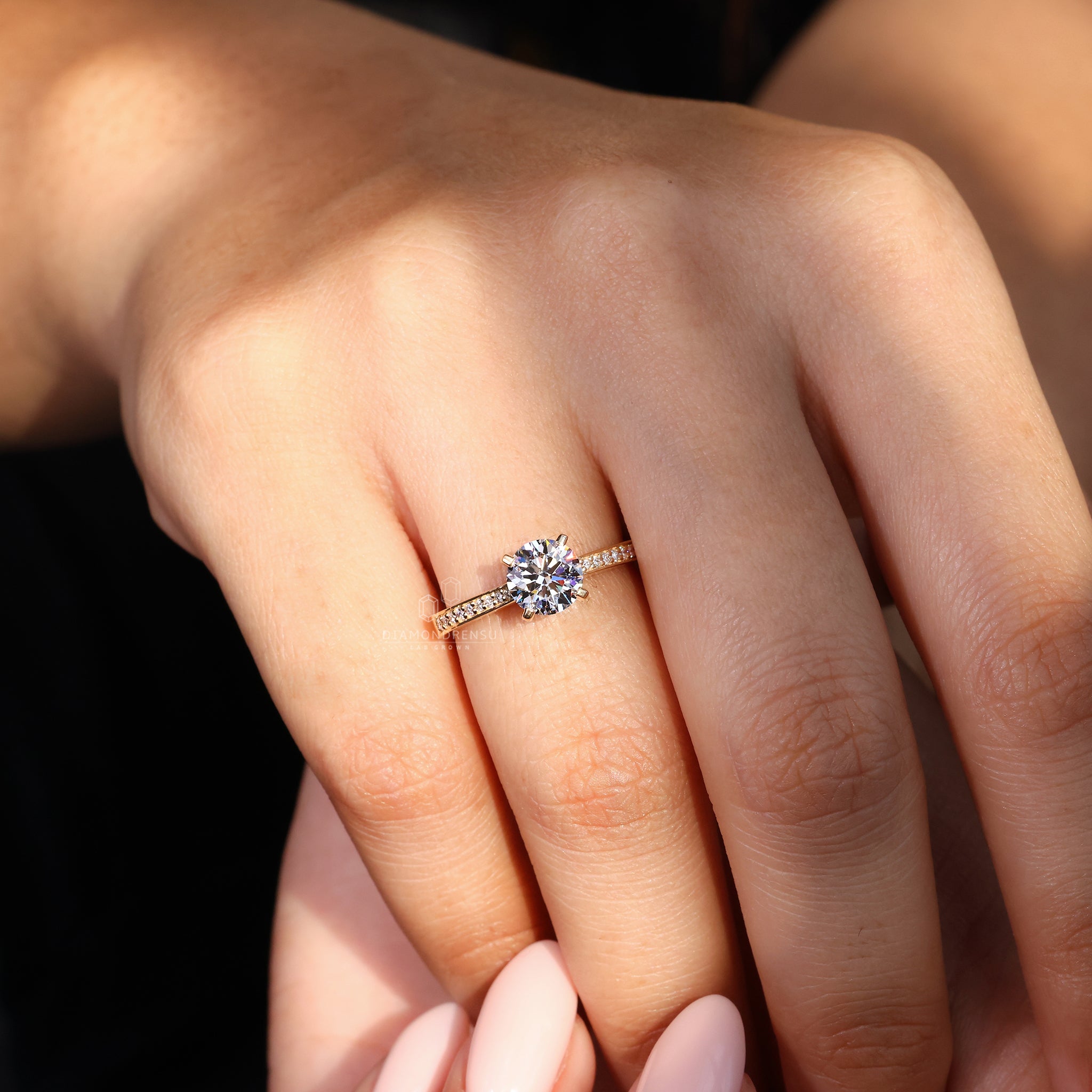 Round diamond channel set ring with handmade ring setting.
