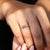 Round diamond channel set ring with handmade ring setting.
