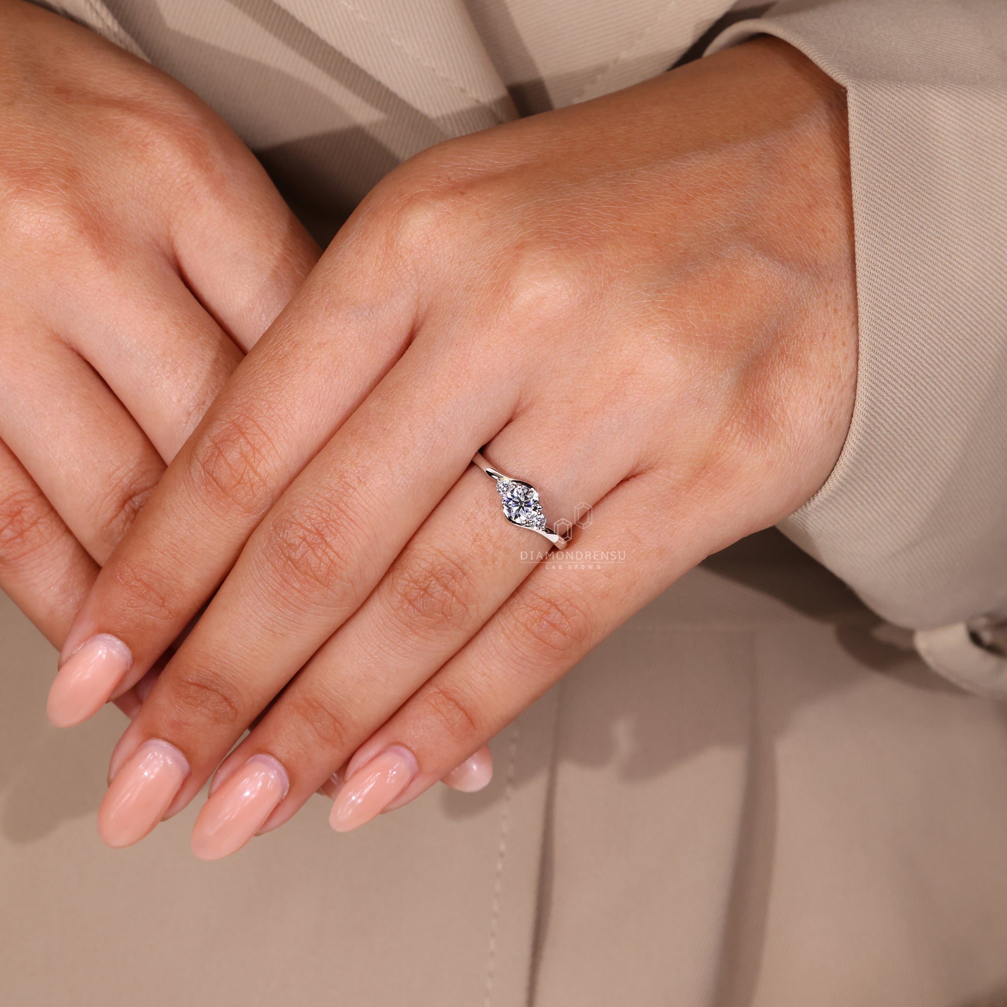 IGI certified diamond in a delicate engagement ring.
