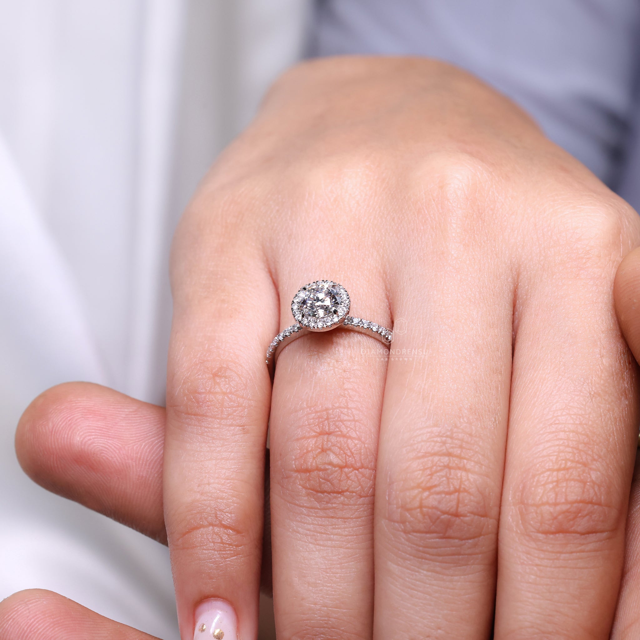 Hidden accent ring featuring round cut diamonds.
