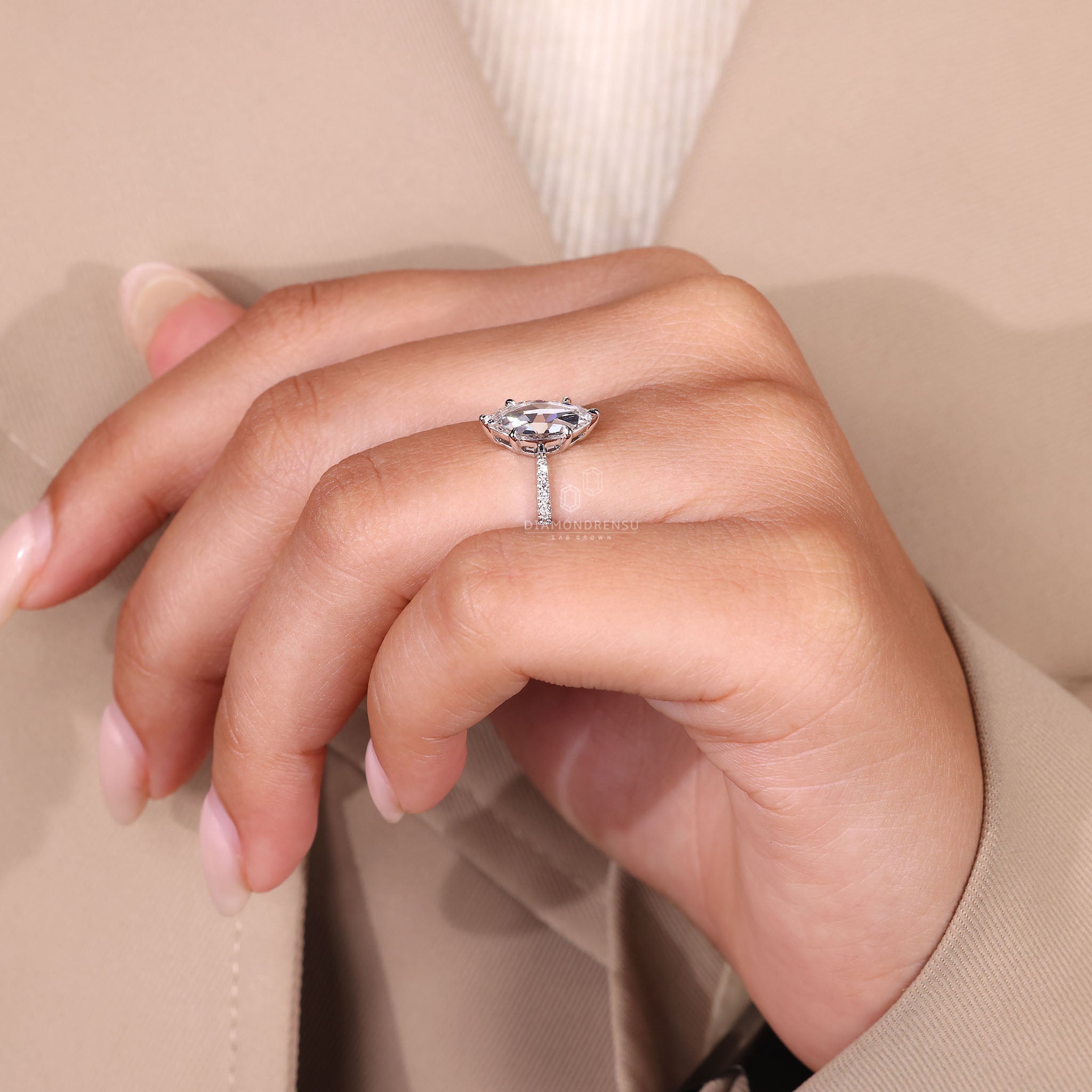 6 prong claw setting holding a rose cut diamond.

