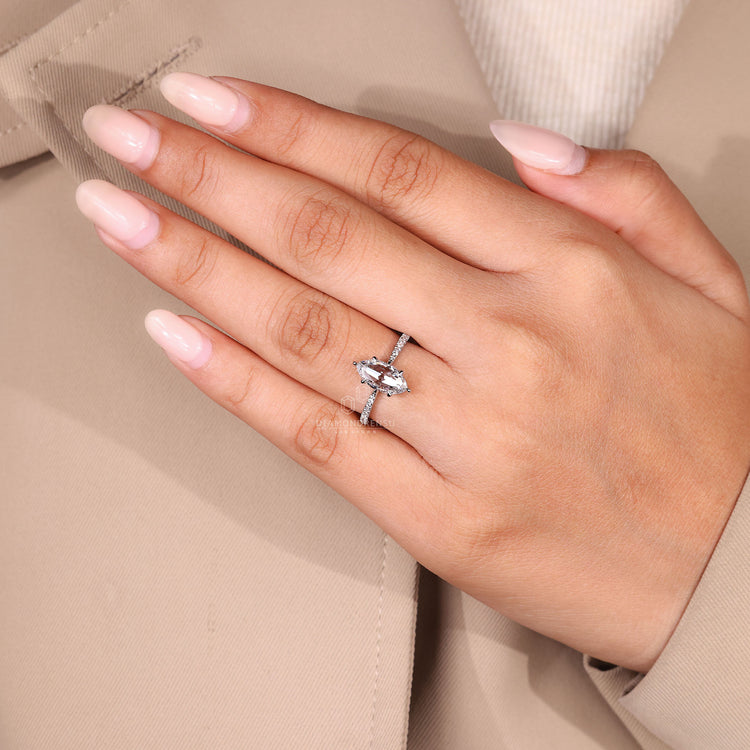 Handmade jewelry featuring a rose cut marquise center.
