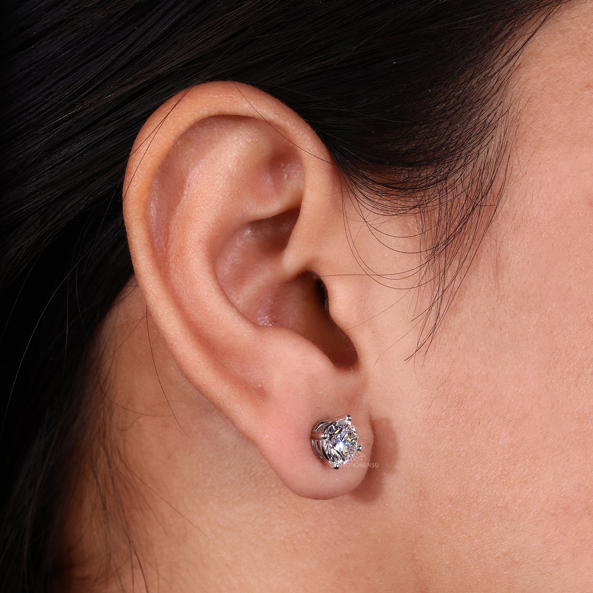 4 prong round diamond earrings.