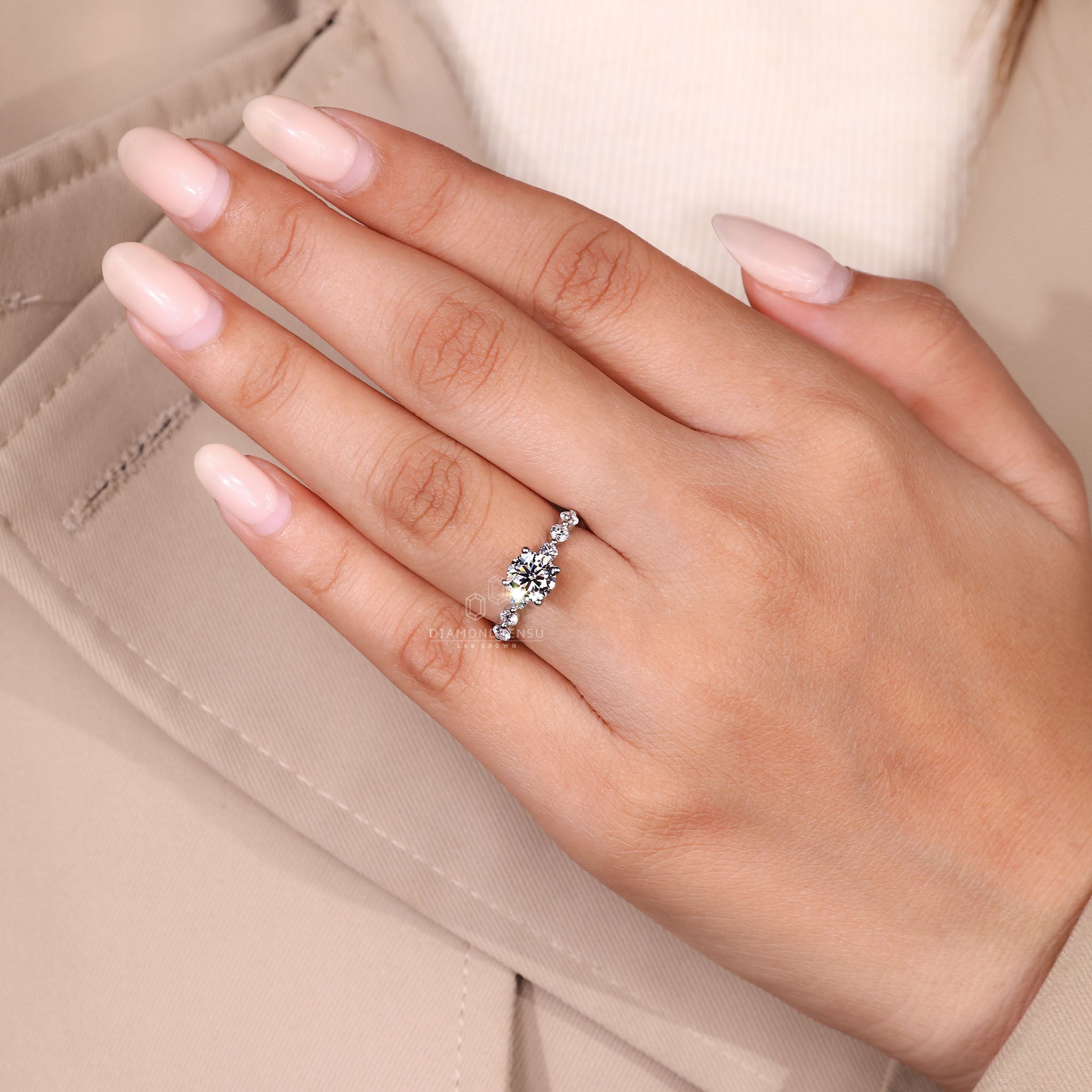 Handmade engagement ring with seven round diamonds