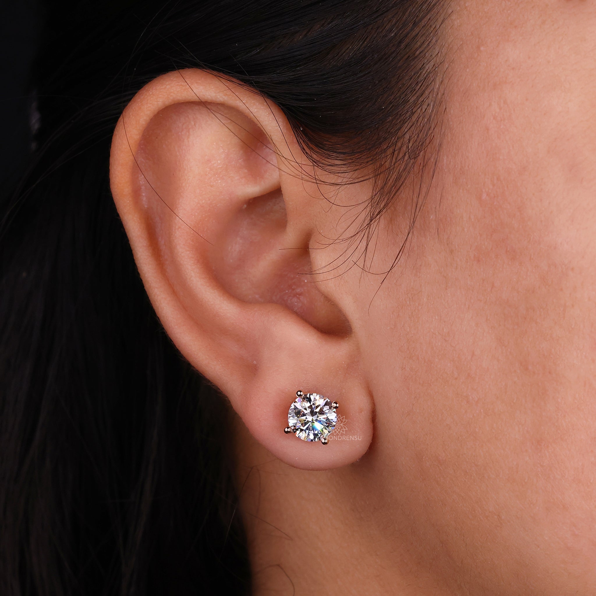 Rose gold stud earrings with lab diamonds.