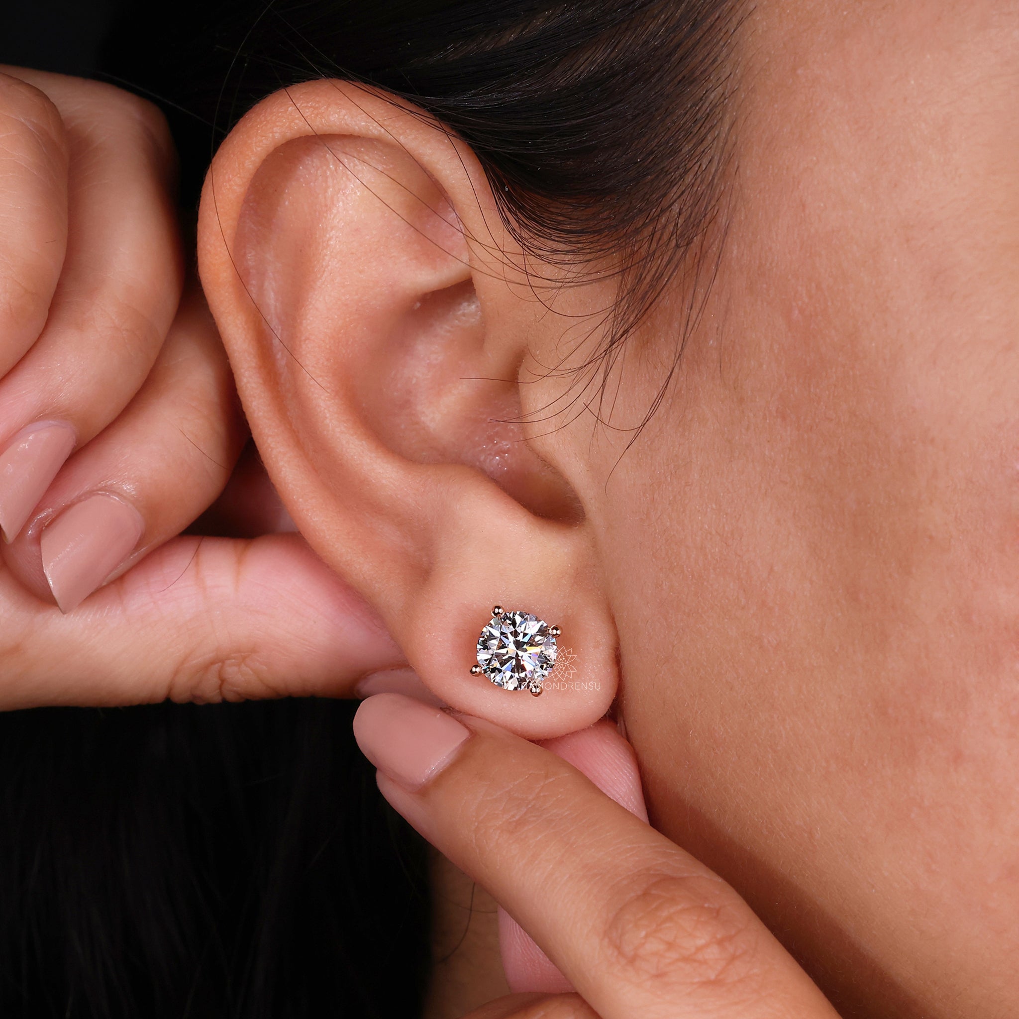 4 prong setting diamond stud earrings.
