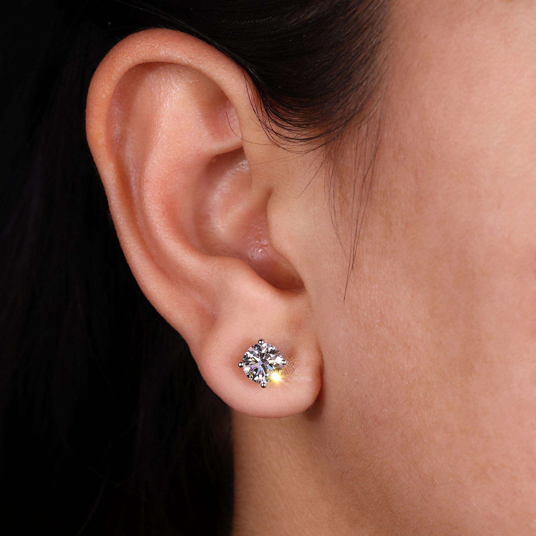 Handmade jewellery with round diamond stud earrings crafted in yellow gold.