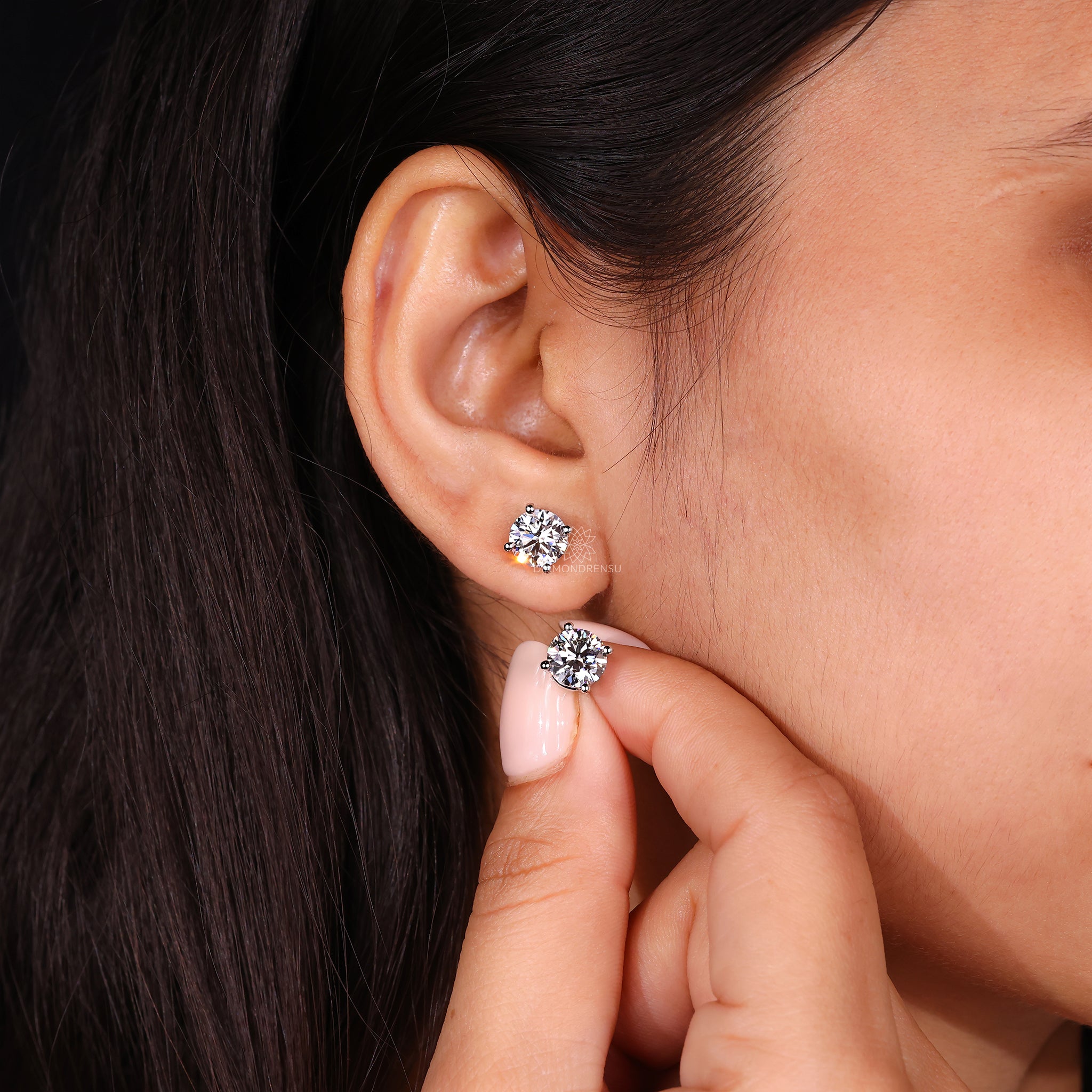 Handmade white gold stud earrings.
