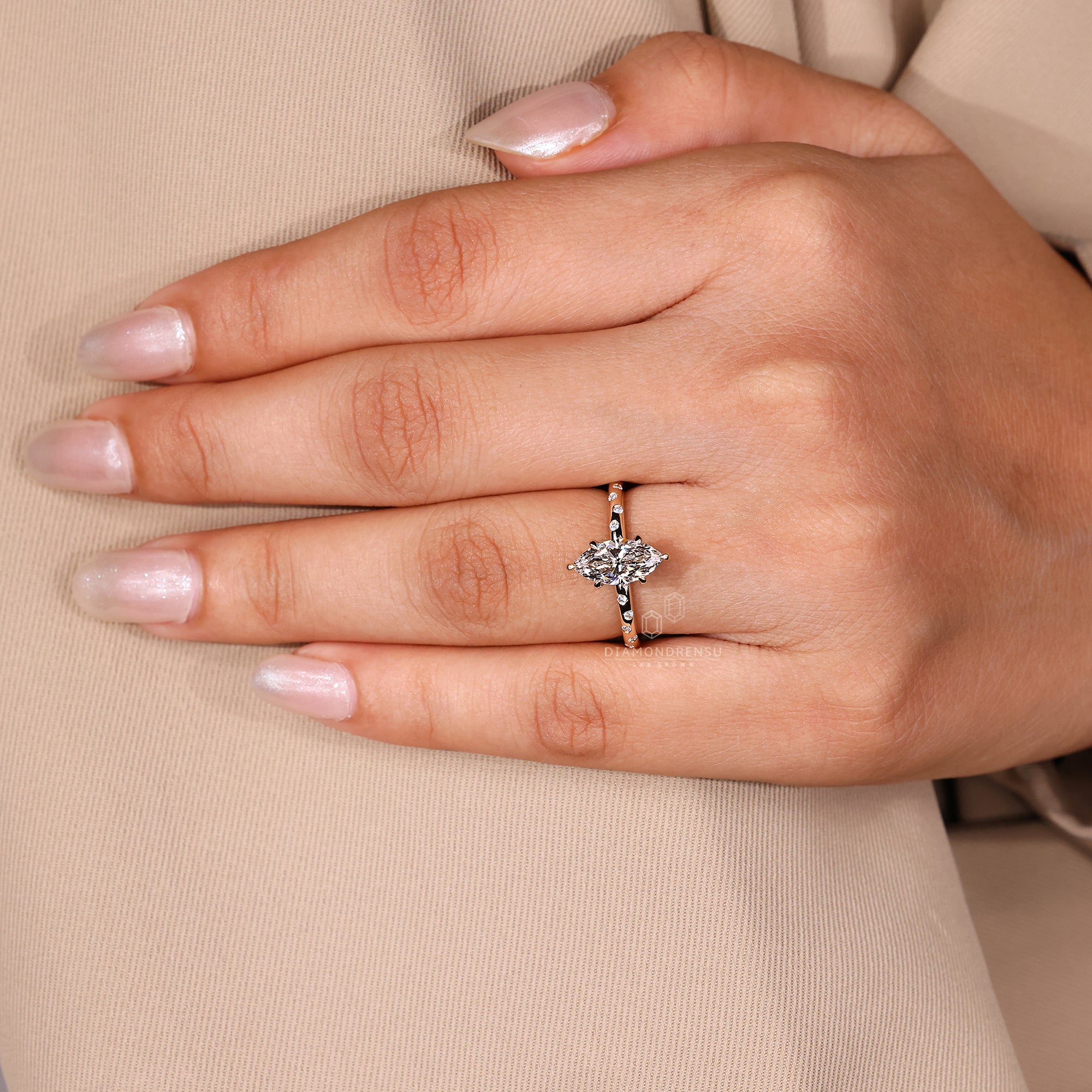 Buy engagement ring with marquise and round diamonds.
