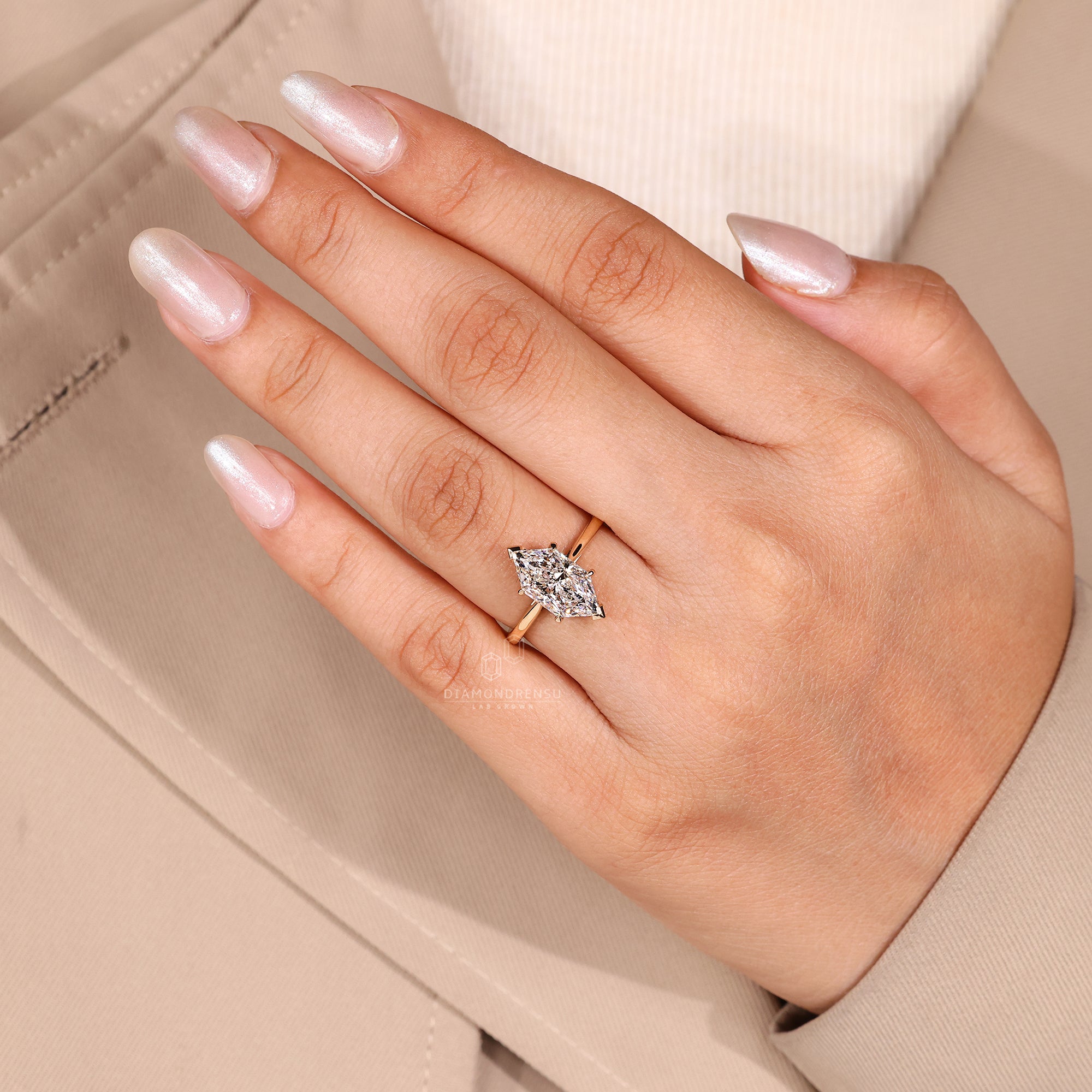Lab diamond ring featuring hidden halo design.
