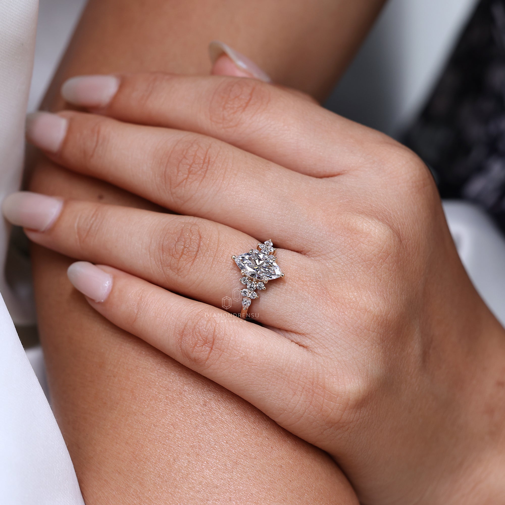 Nature inspired engagement ring with a muse setting.

