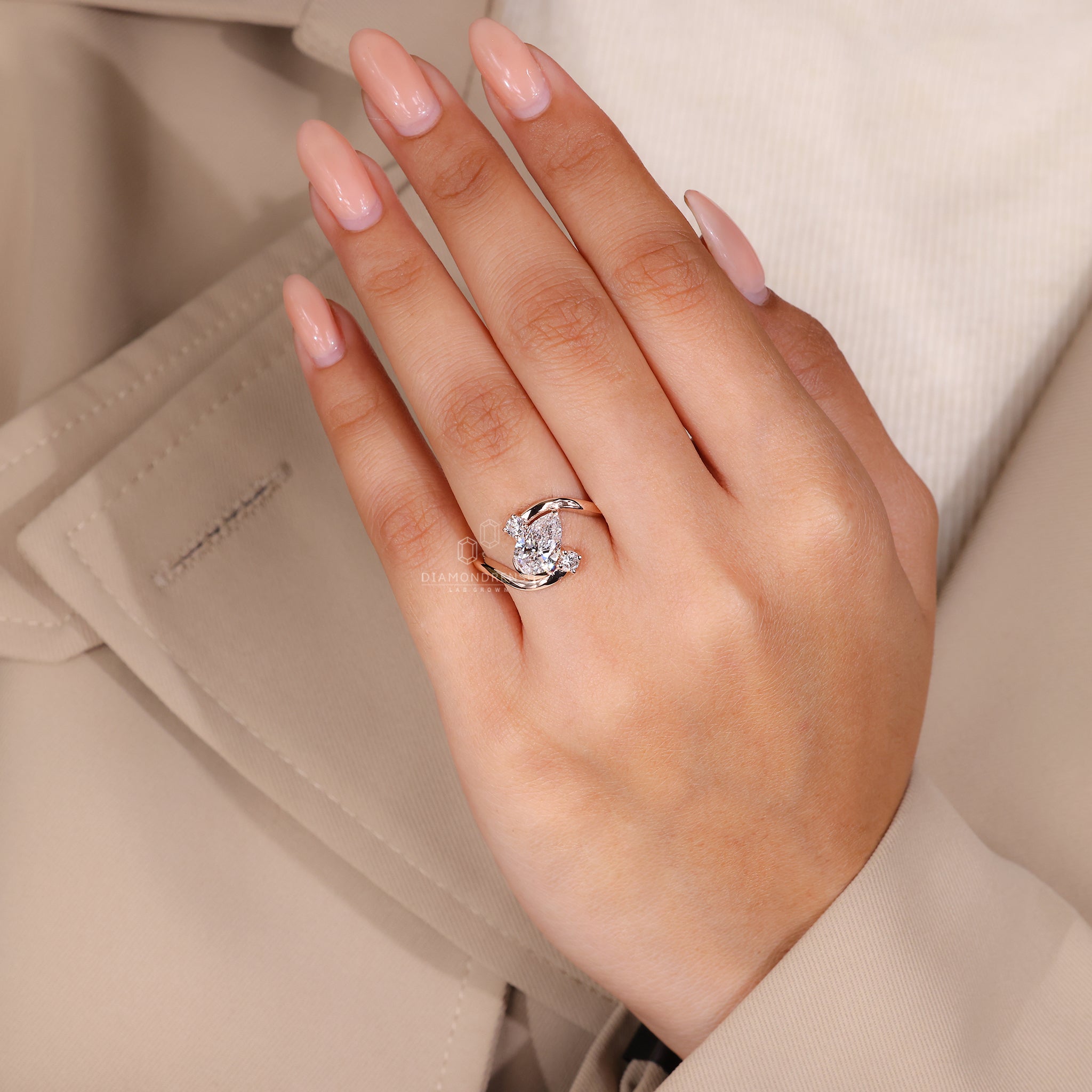 IGI certified pear cut engagement ring in rose gold.
