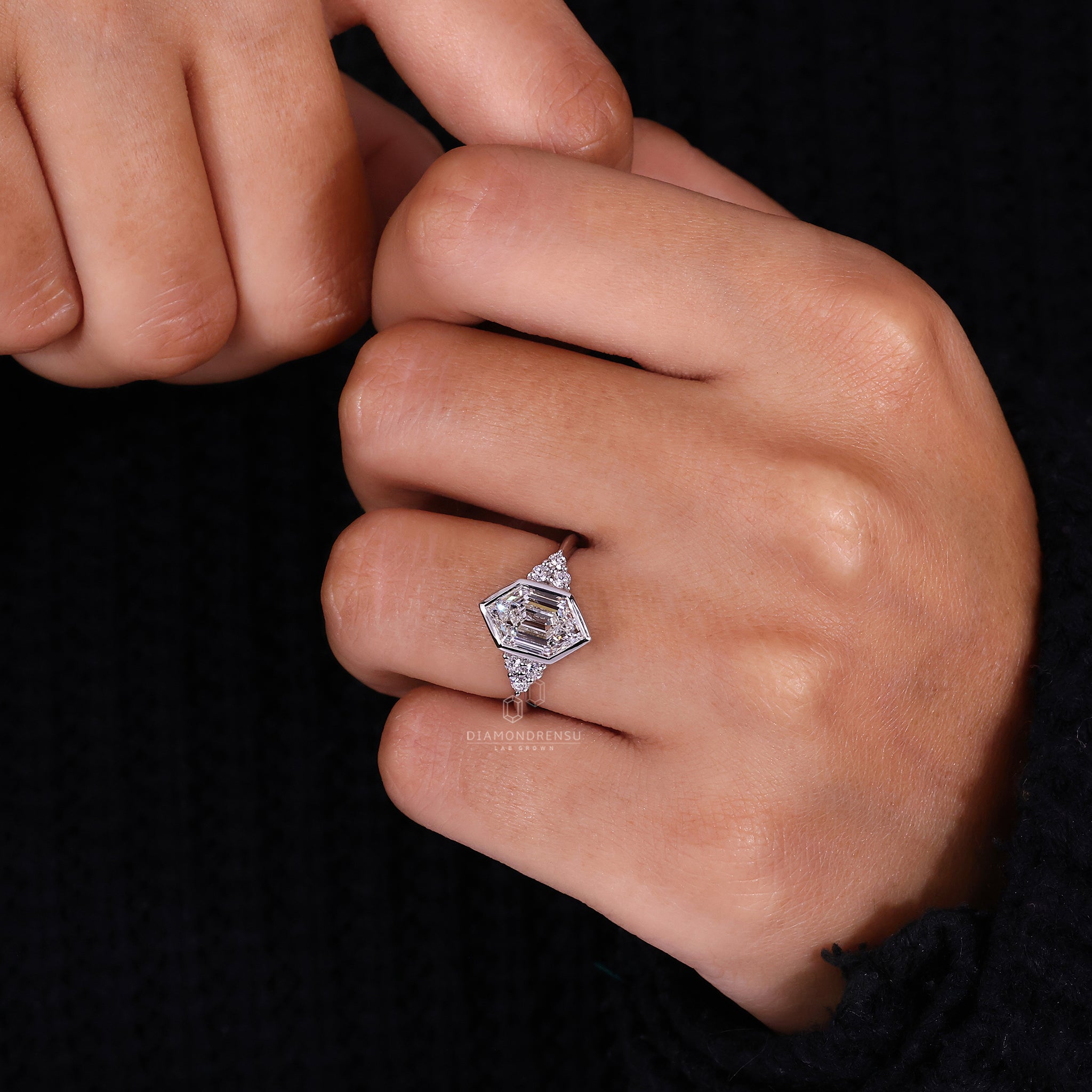 Knife edge shank engagement ring in white gold.
