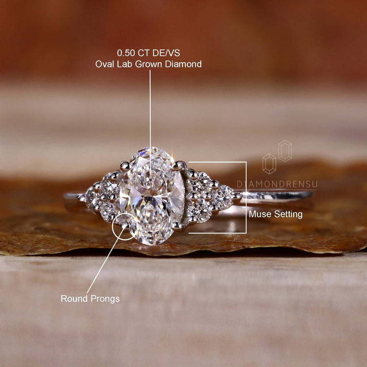 Gorgeous gold ring oval shape with lab grown diamonds.