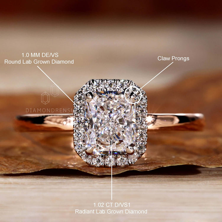 Engage ring UK with a radiant cut diamond and a bespoke halo ring setting in handmade jewelry style.
