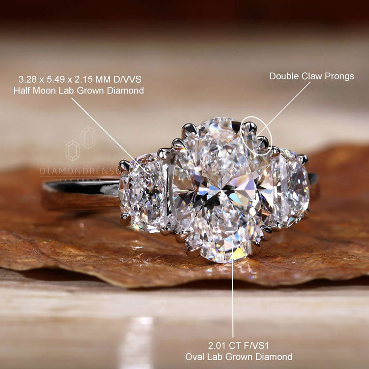 Half moon diamond engagement ring crafted with precision, combining double claw prong setting and stunning handmade jewelry 
