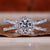 Elegant round diamond engagement ring with a prong setting design.