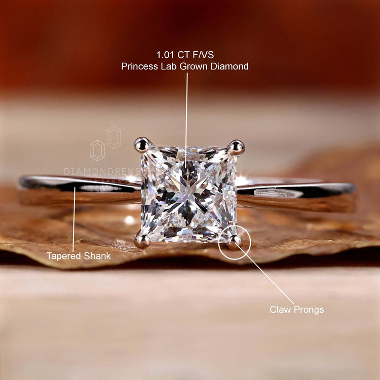 Tapered shank engagement ring featuring lab-grown diamonds.