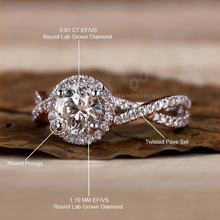 Sophisticated twisted pave ring featuring prong setting.