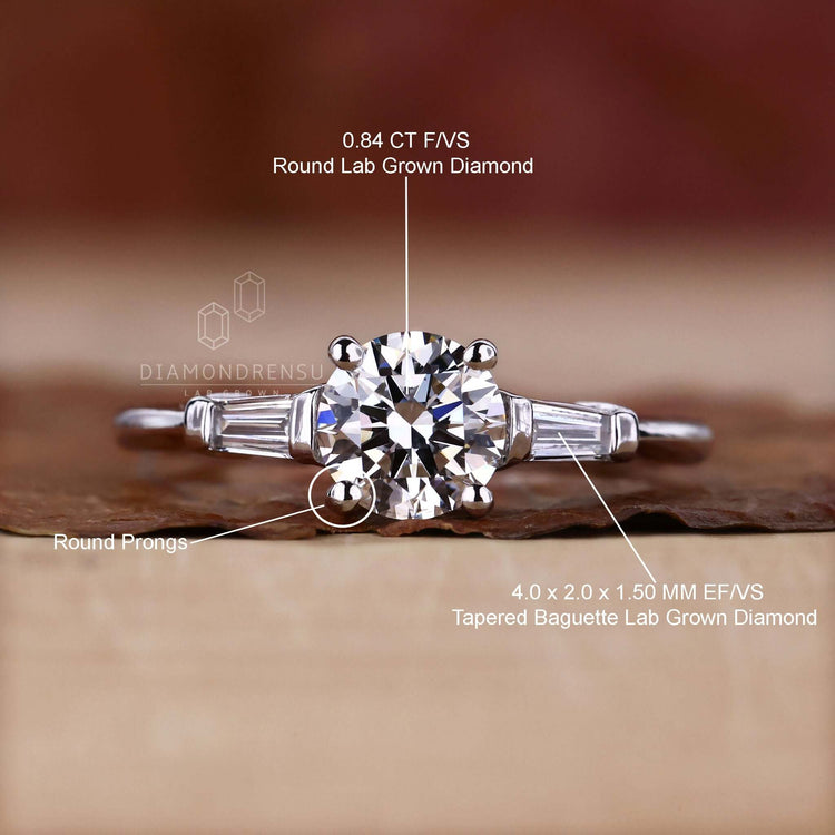 Round brilliant cut engagement ring with a 4 prong round diamond engagement ring setting for modern elegance.
