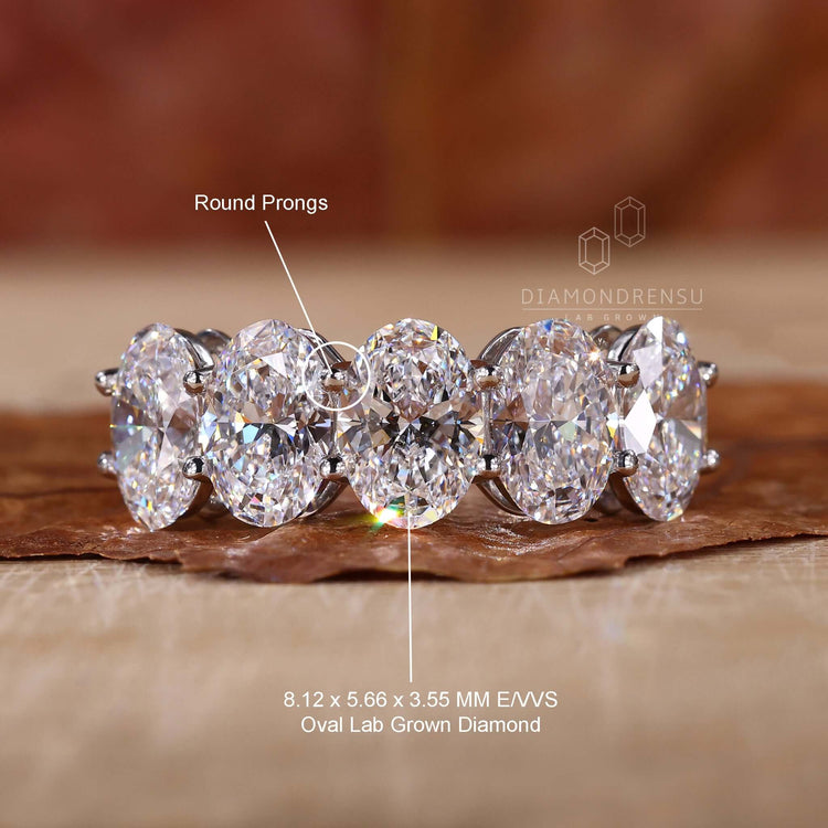 White gold engagement ring with lab grown diamonds for sustainable beauty.