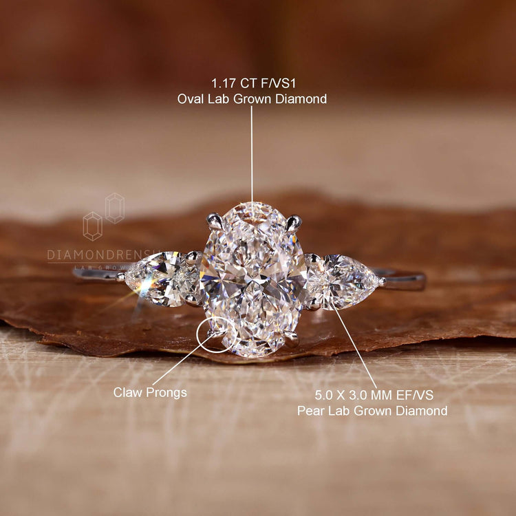Pear shaped diamond ring in a unique setting, perfect for a custom engagement ring in the UK.
