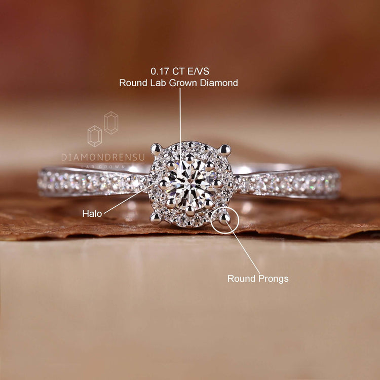 Halo engagement ring in a pave set ring style, combining beauty and durability for unique engagement ring designs.

