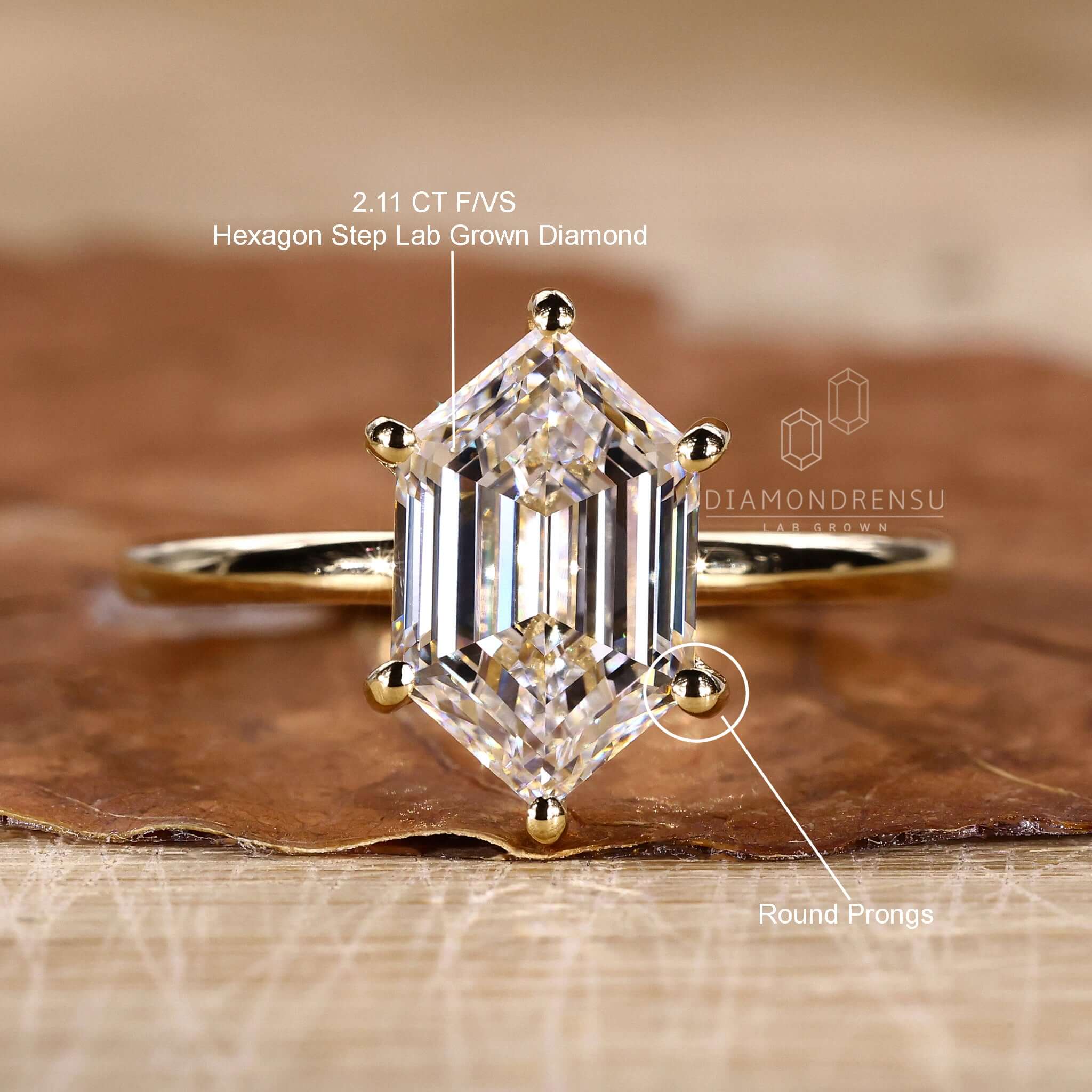 Gold hexagon engagement ring with a setting prong, designed to enhance its natural brilliance.