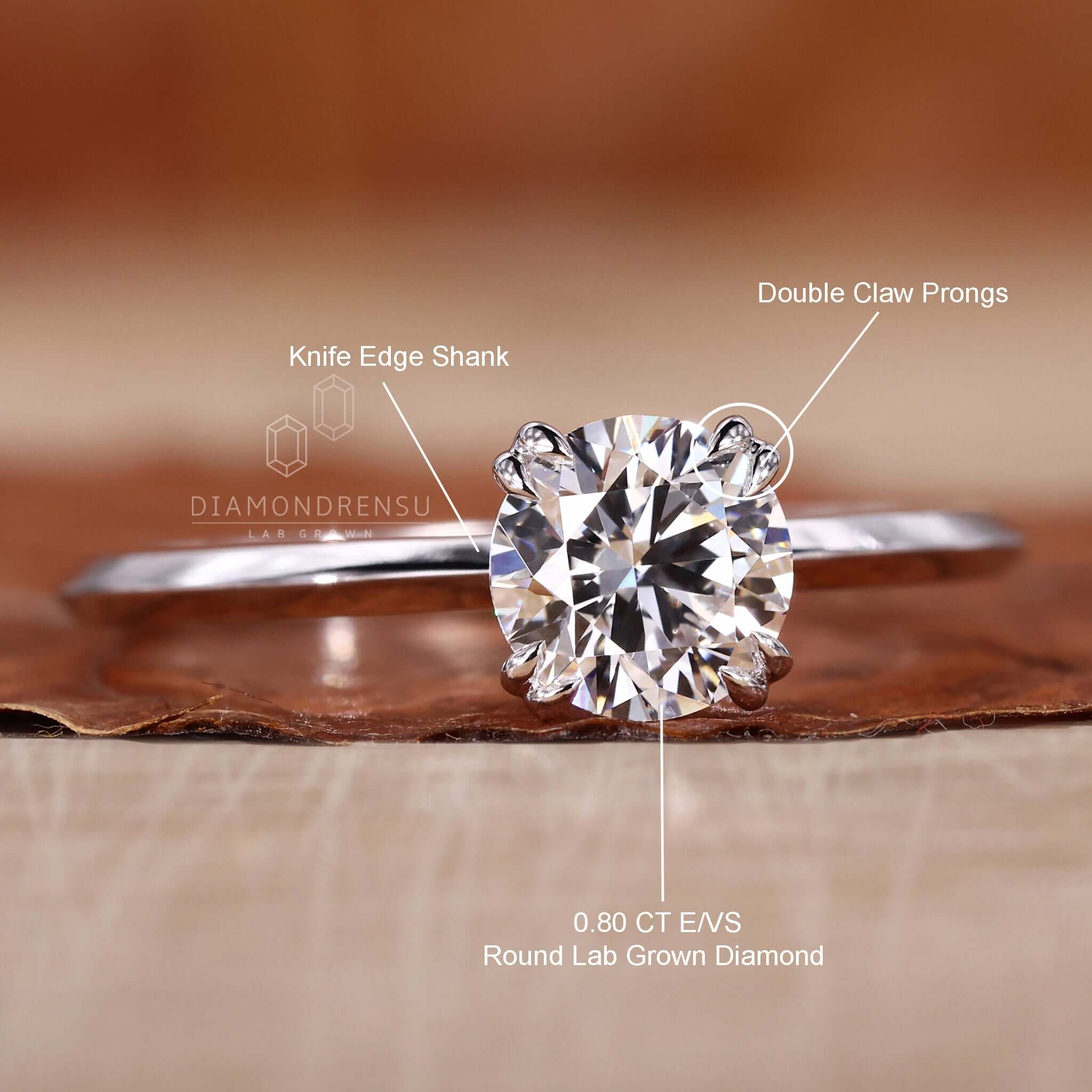 Engagement ring for women showcasing a 2 carat round diamond ring in a uk engagement ring design.
