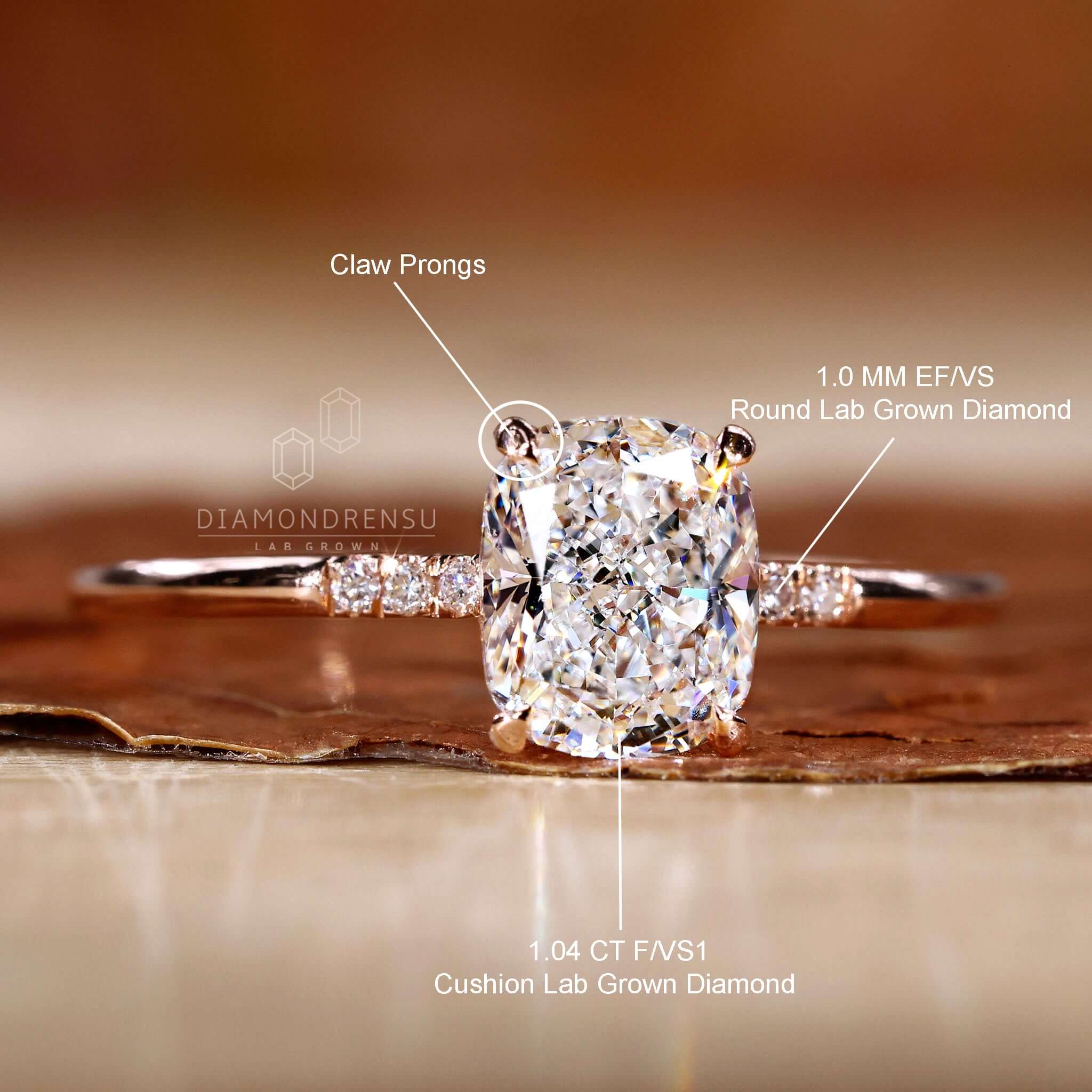 Side stone engagement ring highlighting exquisite diamond accents.