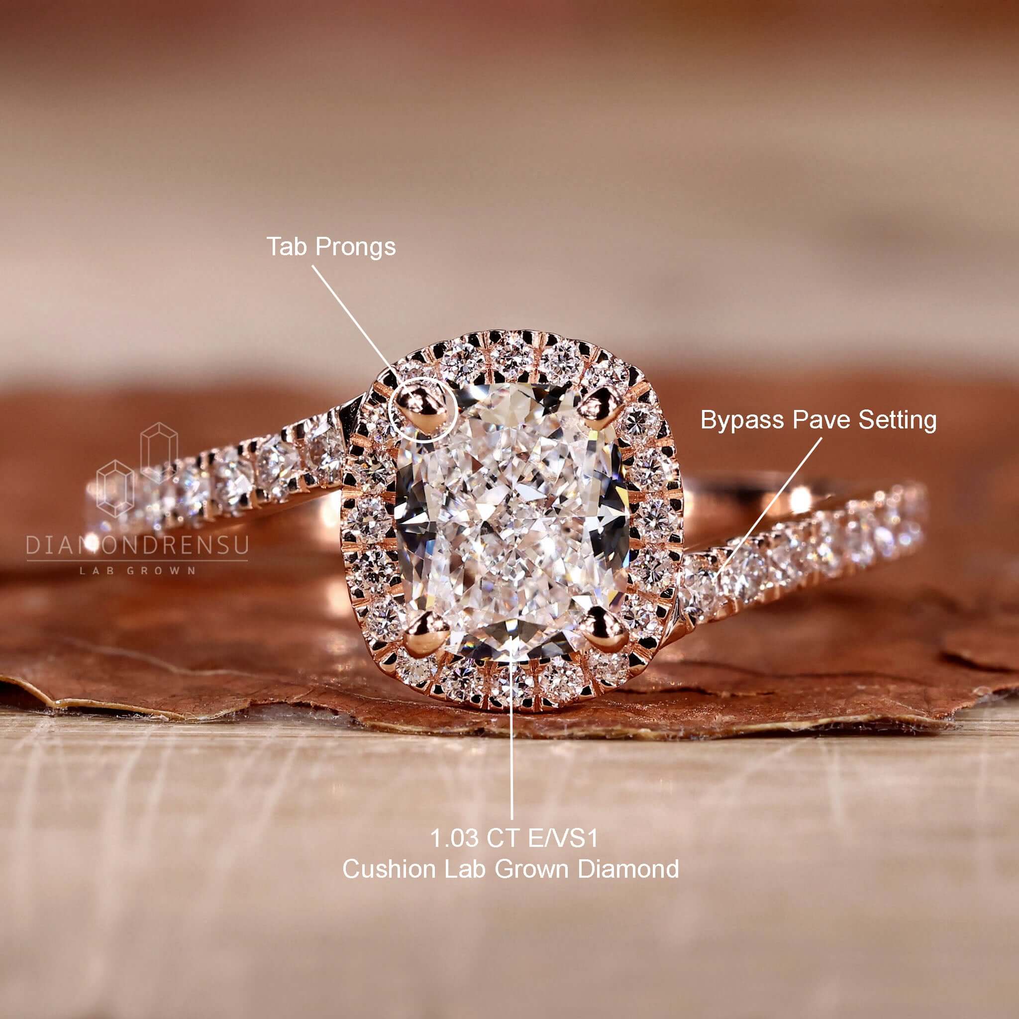 Cushion cut halo engagement ring with intricate detailing.