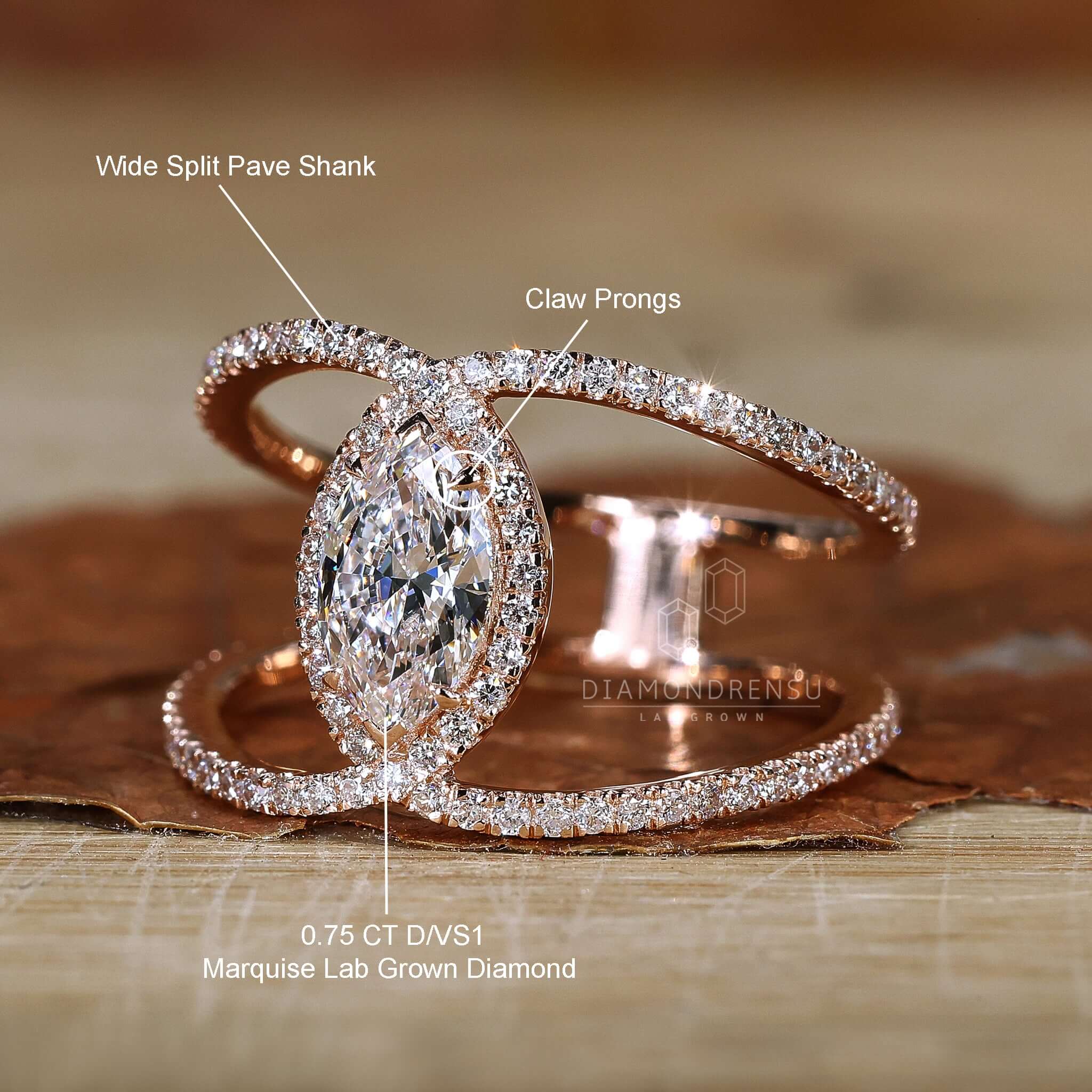 Rose gold ring showcasing a marquise engagement ring design with pave detailing.