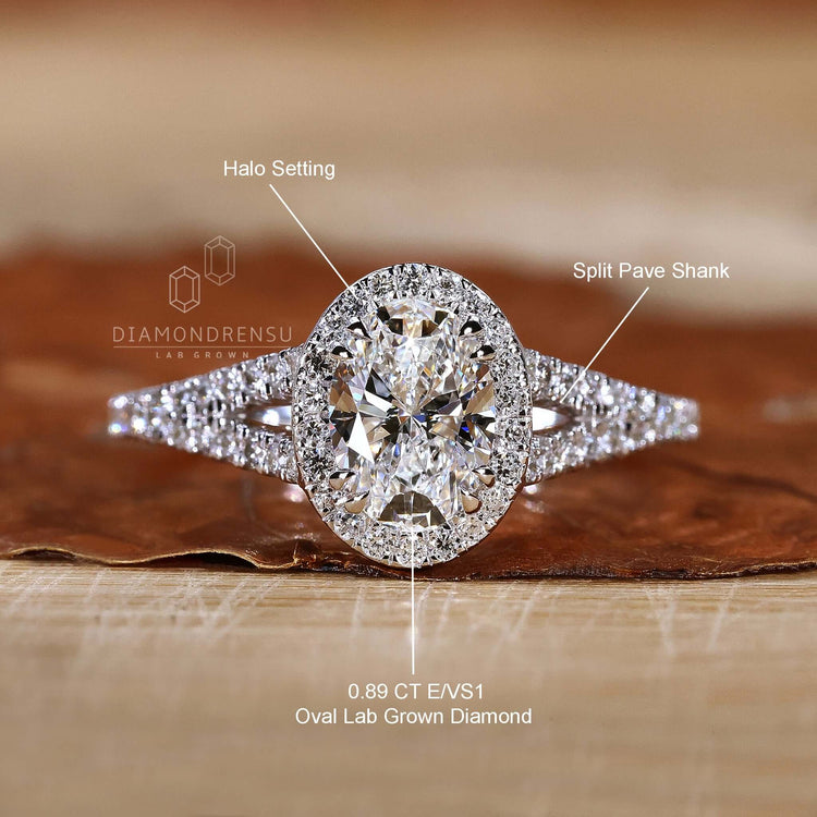 Cathedral setting ring with oval diamond and handmade finish.
