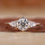 A stunning three stone diamond ring showcasing sparkling brilliance.