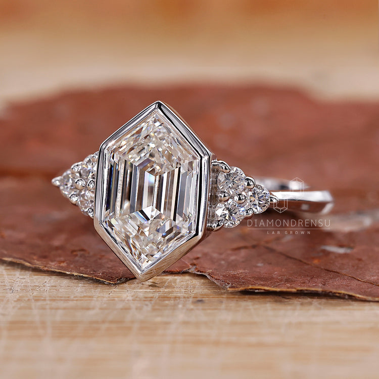 Seven stone diamond ring with a modern muse setting.
