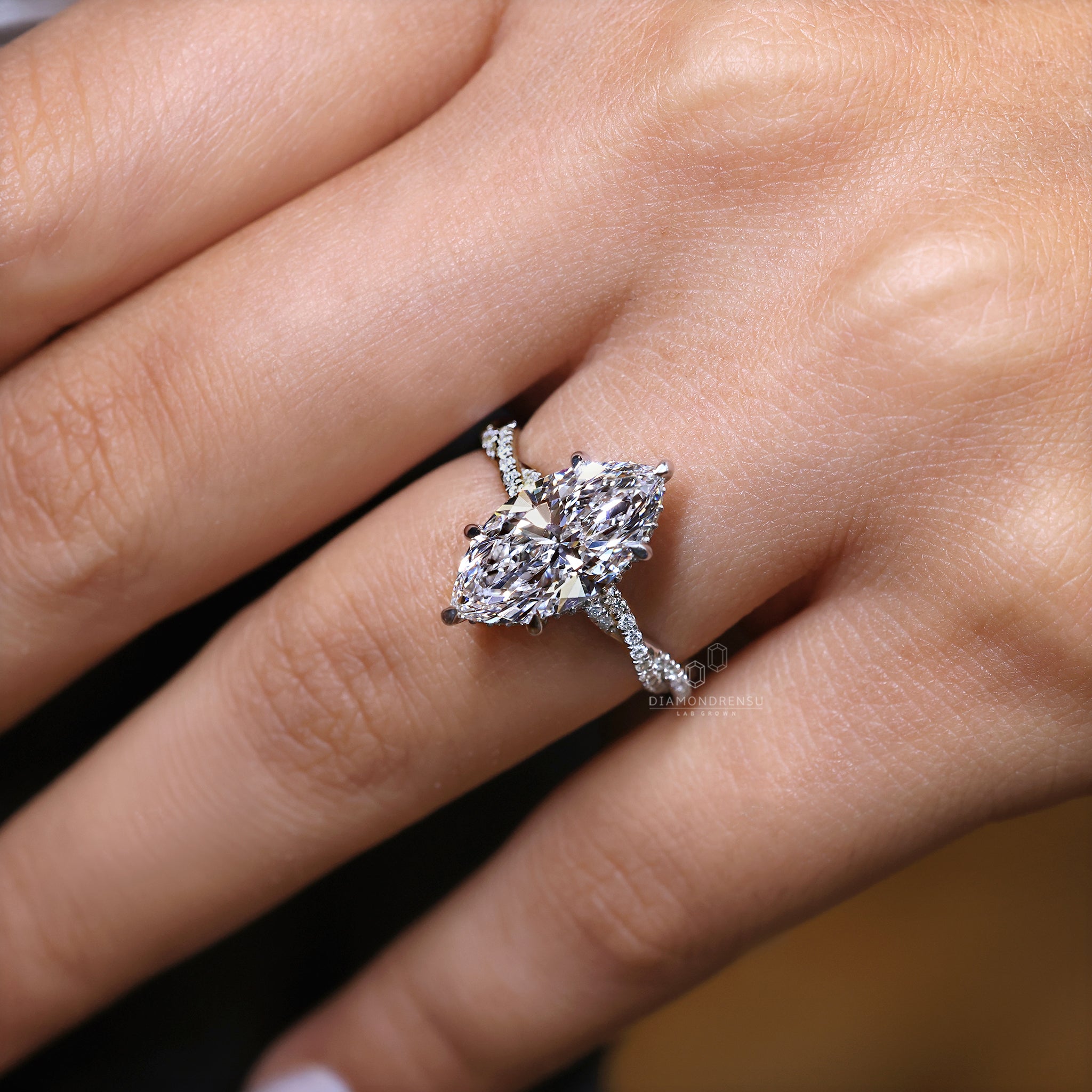 Hidden halo engagement ring crafted in white gold.
