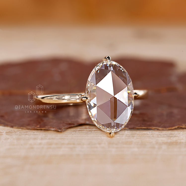 Lab grown oval rose cut ring with solitaire design.