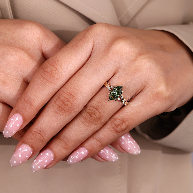 Handmade green diamond ring with art deco style details.