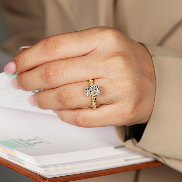 Handmade cushion diamond ring with tulip setting.