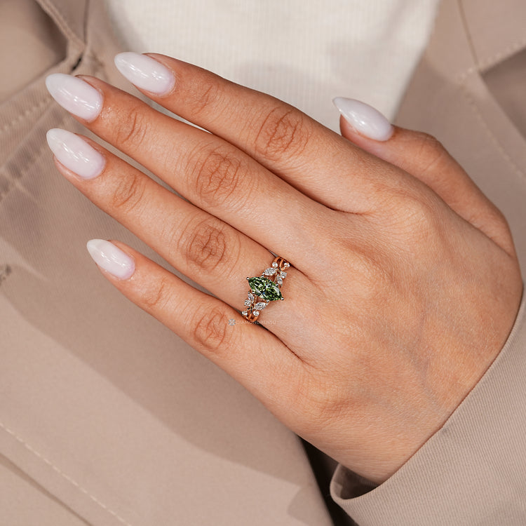 Marquise diamond ring with tulip setting.
