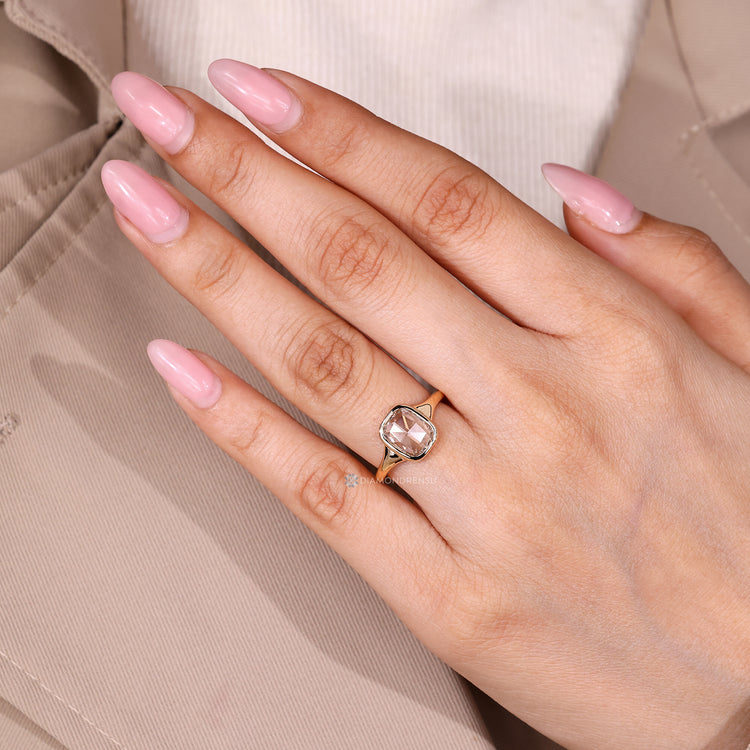 IGI certified bezel ring with cushion diamond.