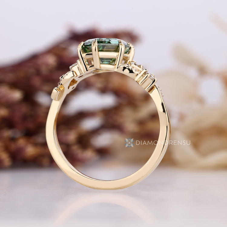 Hexagon cut ring with six leaf style prongs.