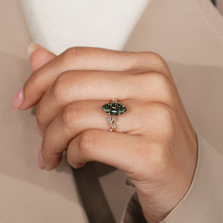 Lab grown diamond ring with six leaf style prongs.