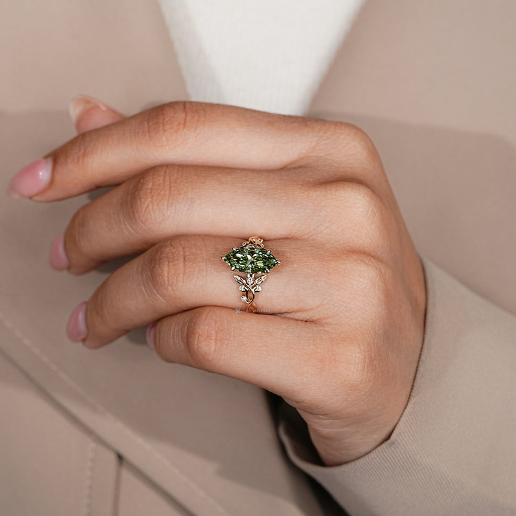 Green centre diamond ring with tulip setting.