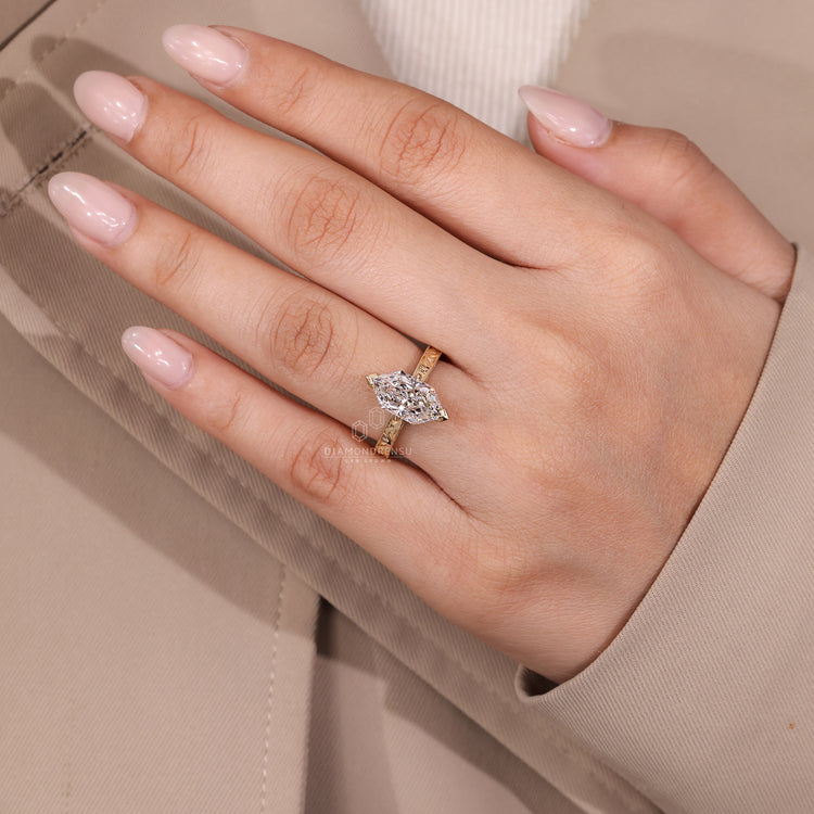 IGI certified lab grown marquise diamond ring with V prongs.