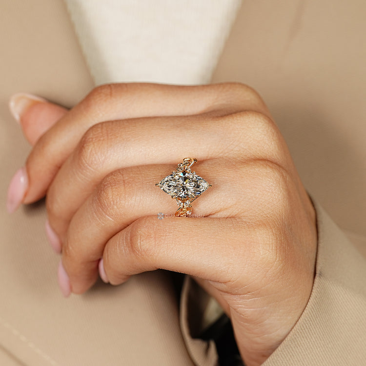 IGI certified marquise diamond ring with round side stones.