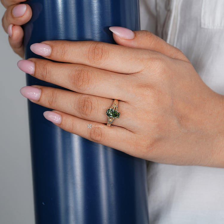 Handmade coffin cut ring with tulip setting.