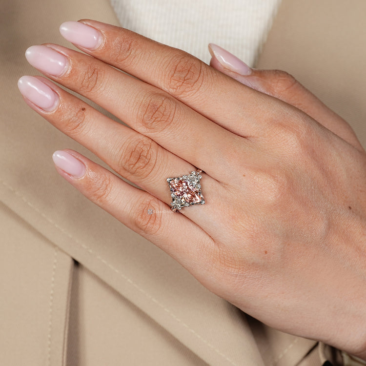 Handmade marquise ring with cluster setting and prongs.