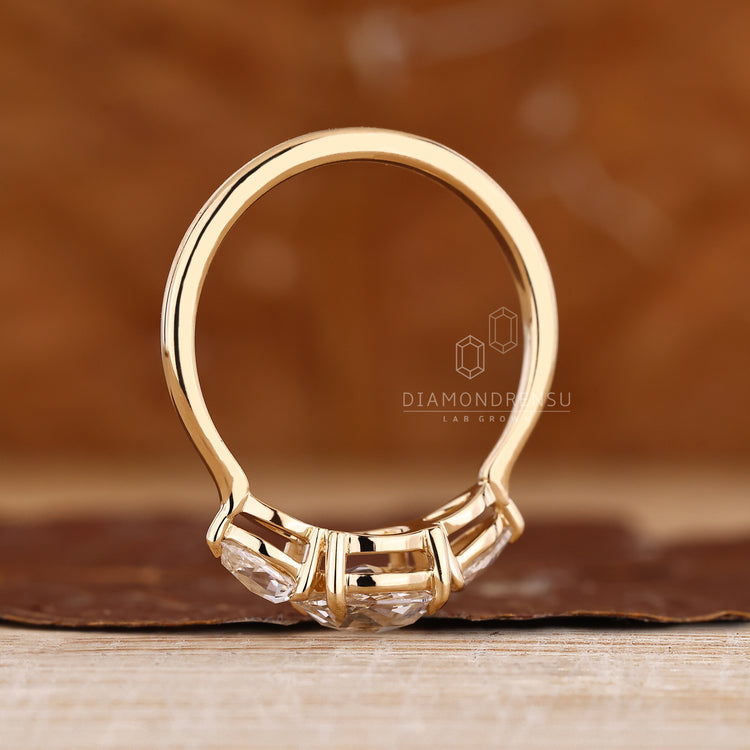 Rose cut diamond ring with pear sides and tapered band.